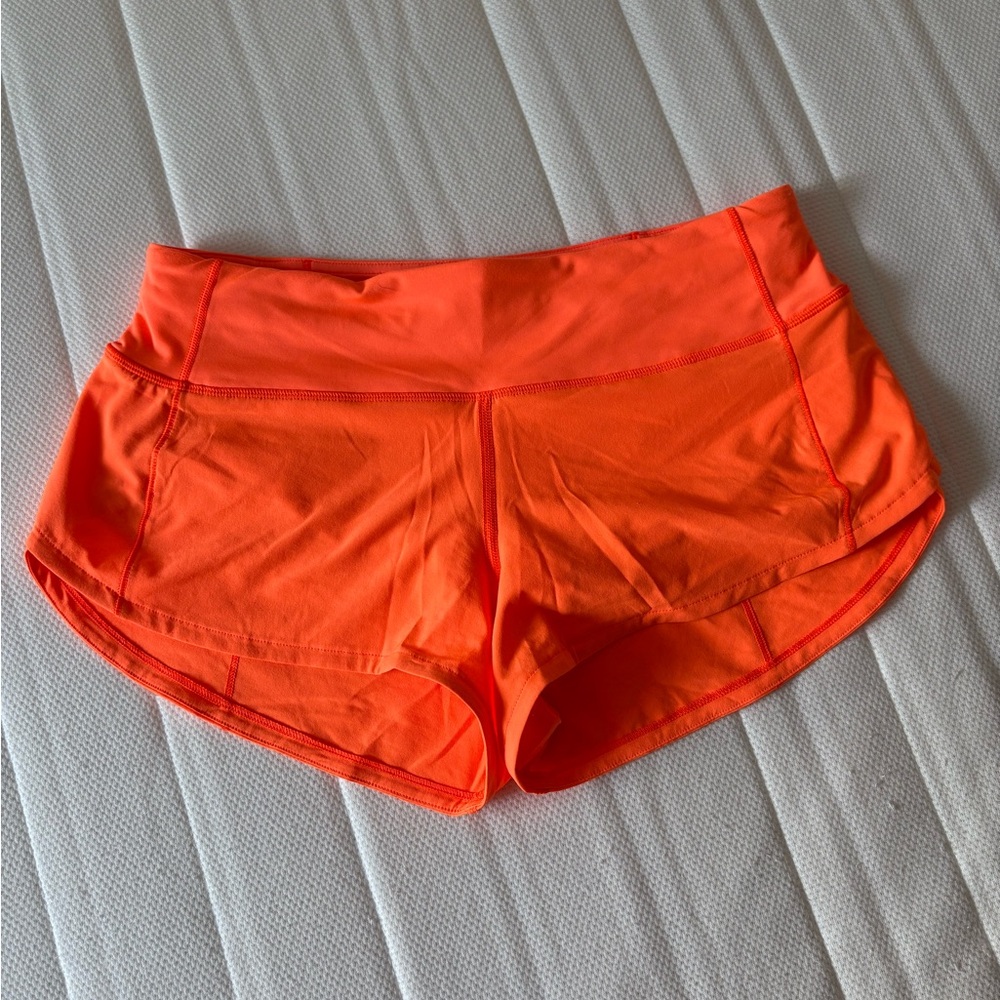 Lululemon bright orange speed up shorts